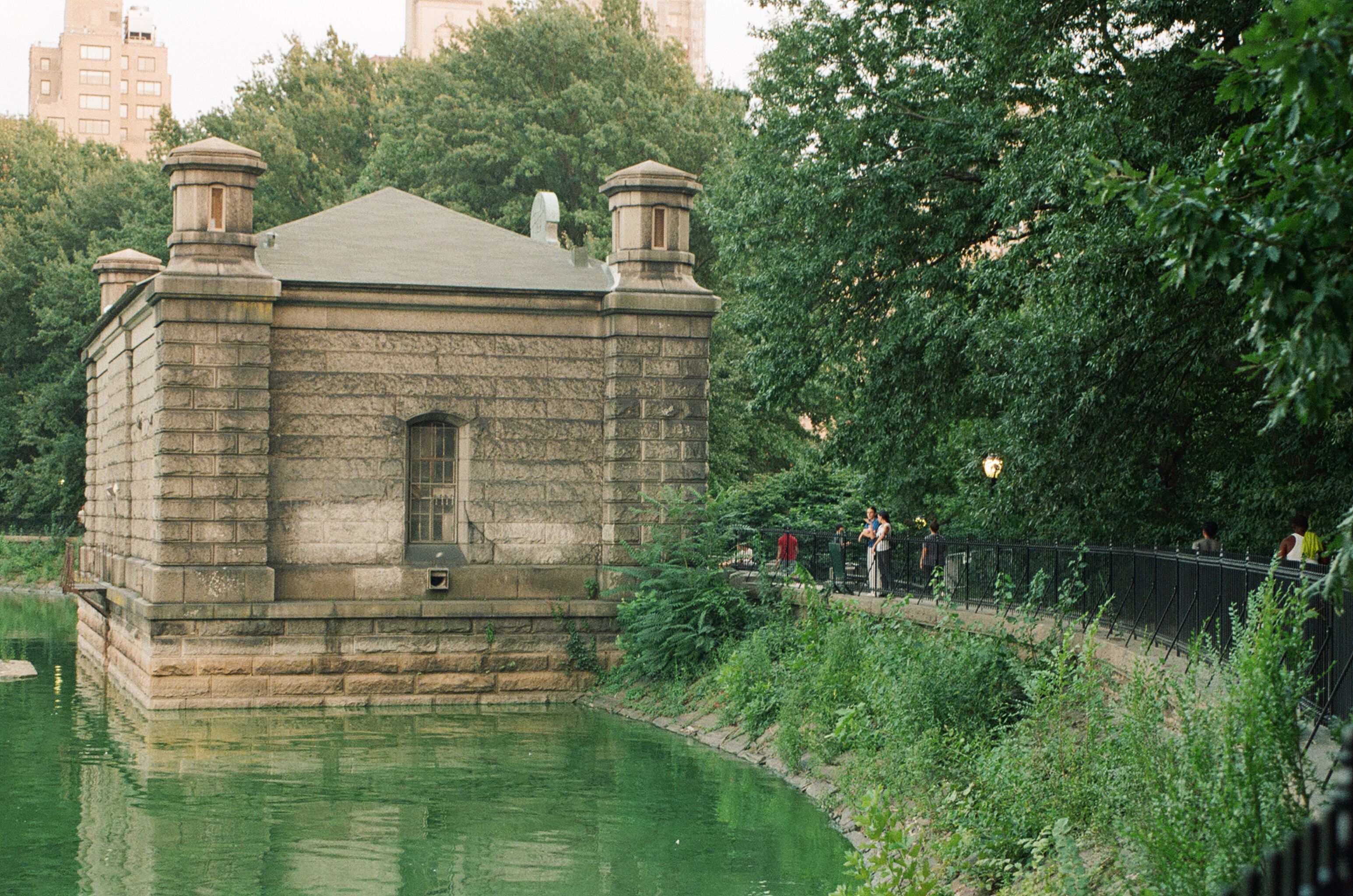 Stone reservoir structure surrounded by greenery